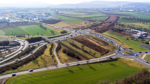 Aerial view of a highway intersection with a clover-leaf interchange Germany Koblenz 