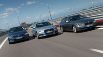 Audi A4, BMW Dreier, VW Passat, Frontansicht