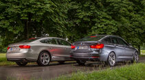 Audi A5 Sportback 3.0 TFSI, BMW 335i GT, Heckansicht