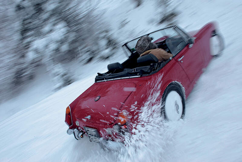 Austin Sprite und Range Rover Vogue