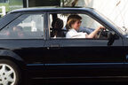 Princess Diana with Prince William on the backseat in her Ford Escort RS Turbo Mk3