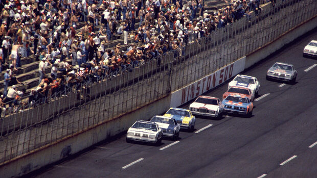 TALLADEGA, AL - MAY 2, 1982: Cale Yarborough (No. 11) keeps in front of an oncoming barrage of cars in the Winston 500 on May 2, 1982 at the Talladega Speedway in Talladega, Alabama. (Photo by ISC Archives/CQ-Roll Call Group via Getty Images)